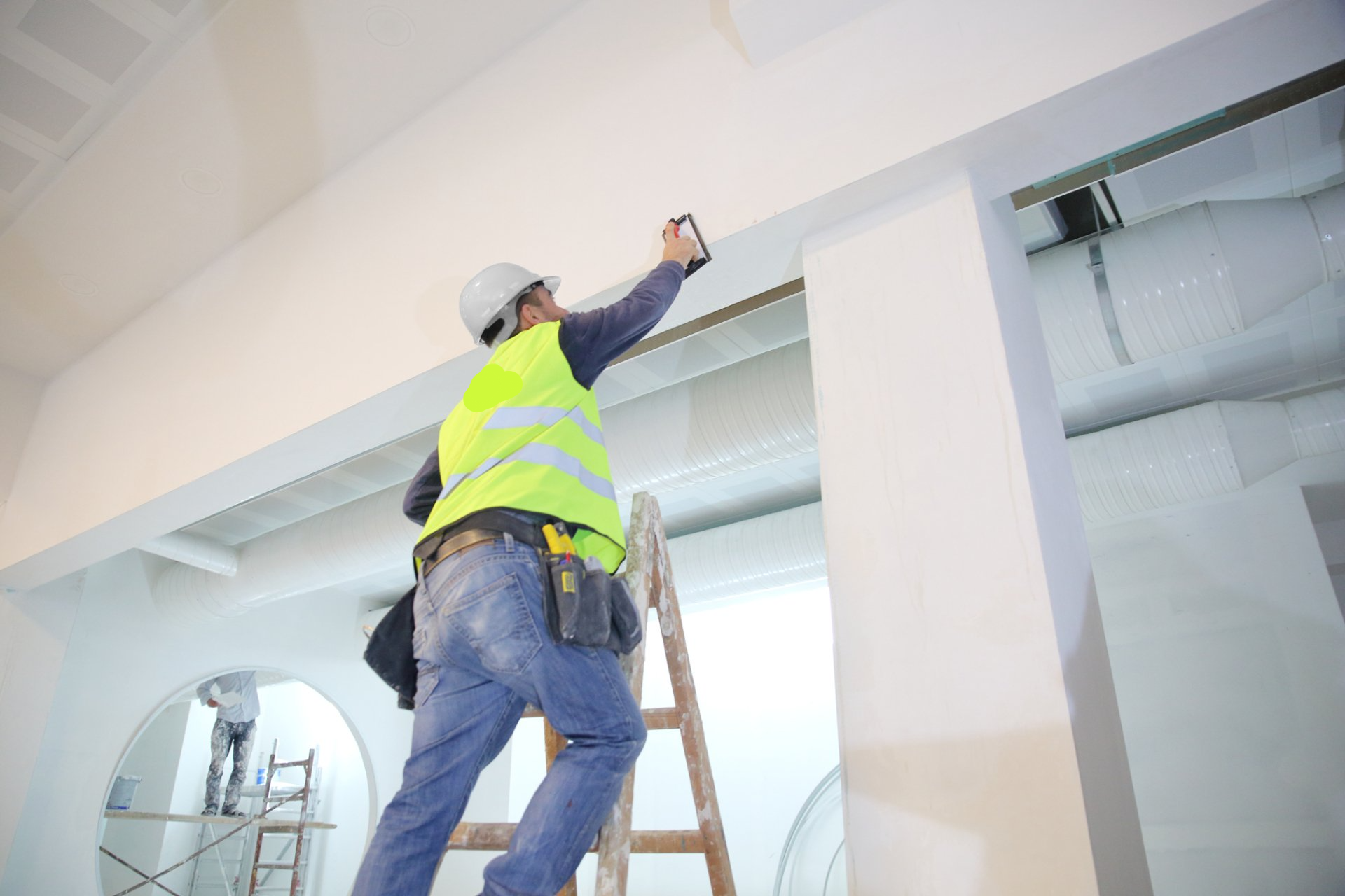 Man constructing house