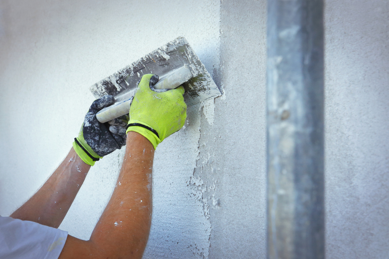 man plastering