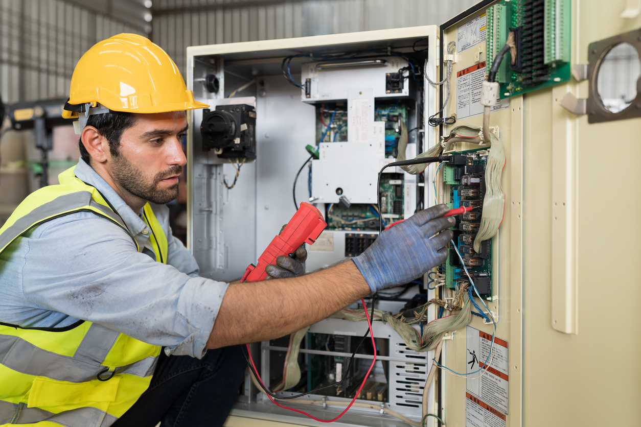 man testing voltage
